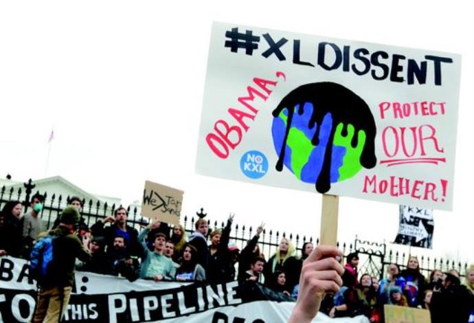 הפגנה של פעילי איכות הסביבה בארה"ב נגד תעשיית הנפט (צילום:  רויטרס)