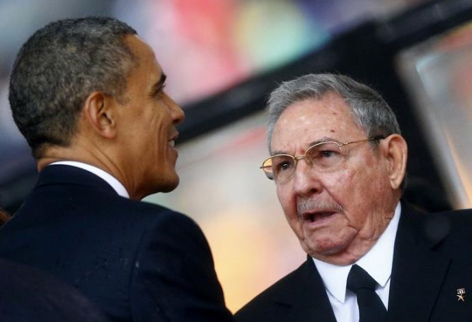ברק אובמה וראול קסטרו (צילום:  רויטרס)
