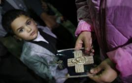 ילד עיראקי בכנסיה  (צילום: רויטרס)