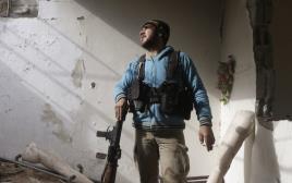 מורדים במלחמה בסוריה (צילום: רויטרס)