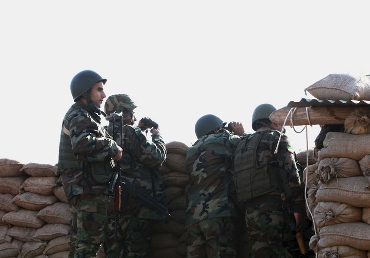 לוחמי הפשמרגה הכורדית בחזית בצפון עיראק. צילום: רויטרס