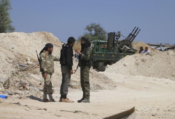 מורדים במחוז אידליב בסוריה (צילום:  רויטרס)