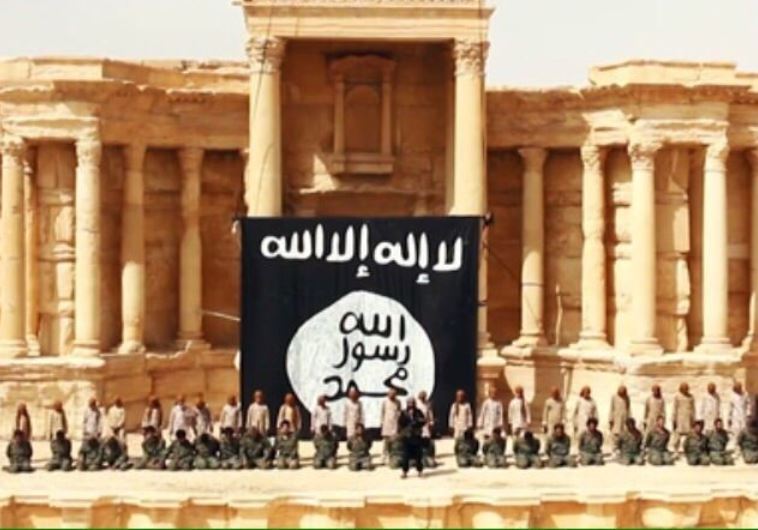 לא רק מעשי אכזריות, לוחמי ארגון דאעש בהוצאה להורג בעיר תדמור בסוריה. צילום: רויטרס