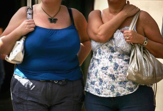 נשים בעלות עודף משקל (צילום:  Getty images)