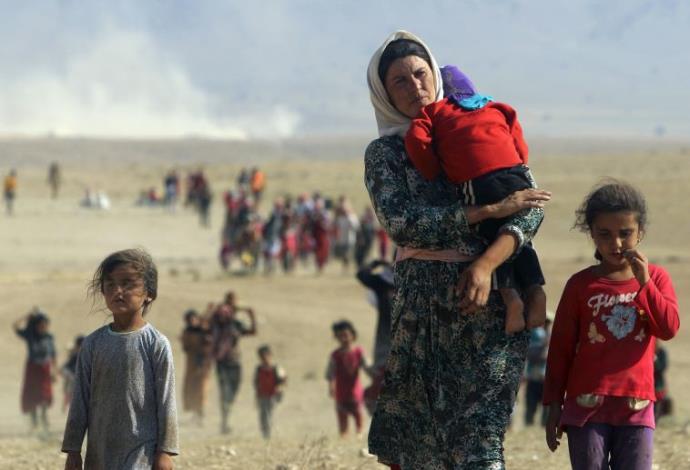 פליטים יזידים בעיראק (צילום:  רויטרס)