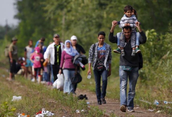 מהגרים בהונגריה (צילום:  רויטרס)