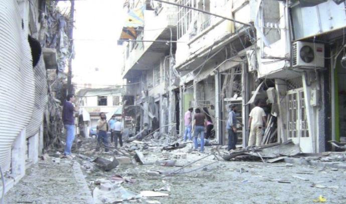 מבנה שהותקף בעיר זבדאני, סוריה (צילום: רויטרס)