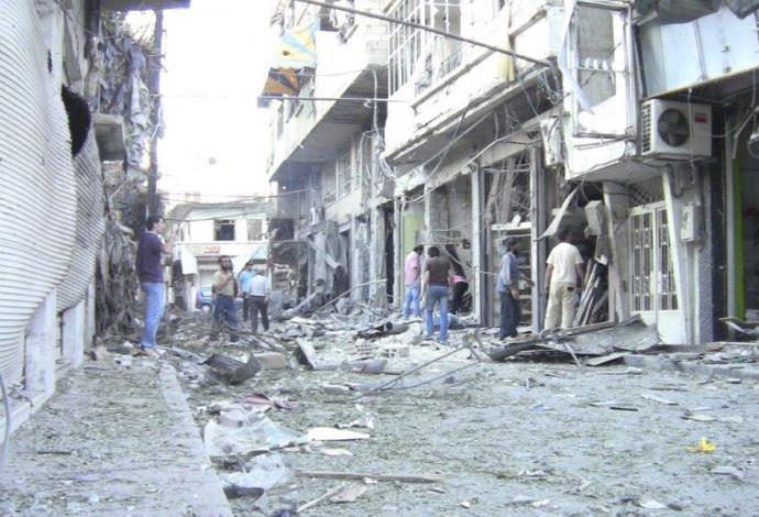 מבנה שהותקף בעיר זבדאני, סוריה (צילום:  רויטרס)