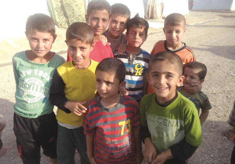 ילדים במחנה פליטים יזידי. צילום: רויטרס