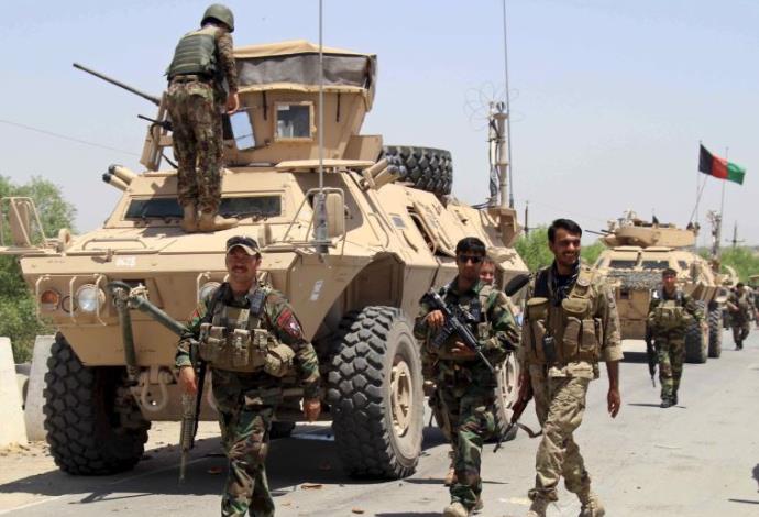 כוחו תהצבא האפגני בעיר קונדוז (צילום:  רויטרס)