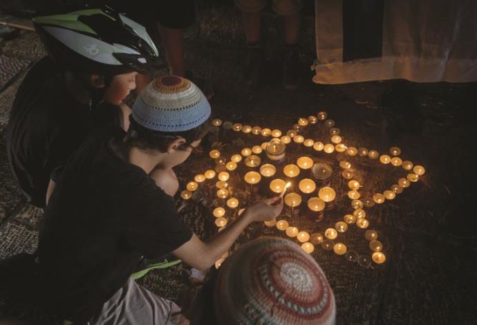 נרות לזכר נרצחי הפיגועים בירושלים, השבוע (צילום:  מרים אלסטר, פלאש 90)
