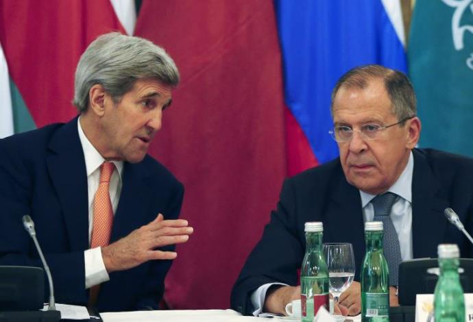 ג'ון קרי וסרגיי לברוב בשיחות על סוריה בווינה (צילום:  רויטרס)