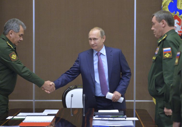 שר ההגנה שויגו יחד עם פוטין.. צילום: רויטרס