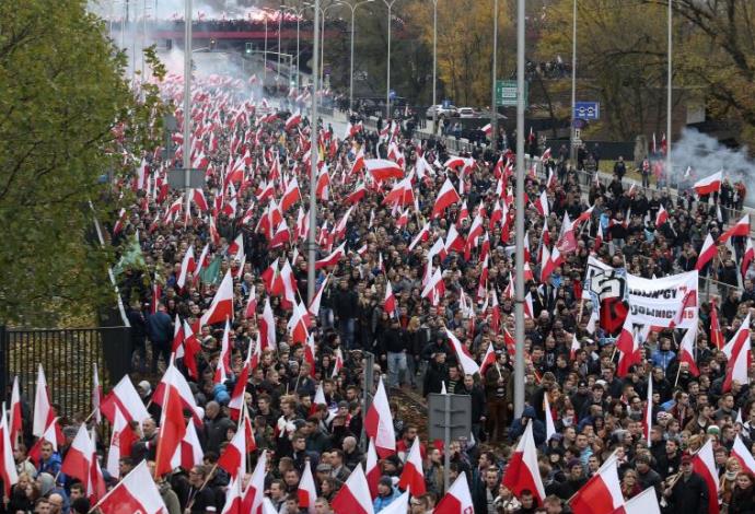 פולנים מפגינים נגד מהגרים (צילום:  רויטרס)