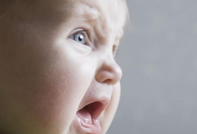 תינוקת בוכה (צילום:  אינגאימג)