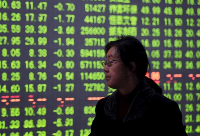 ירידות בבורסה בסין (צילום:  רויטרס)