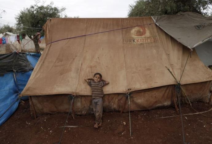 מחנה פליטים בסוריה (צילום:  רויטרס)