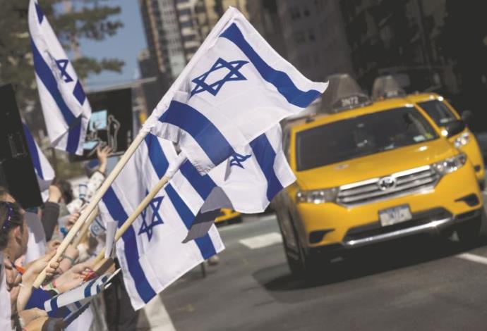 דגלי ישראל מונפים בארצות הברית (צילום:  רויטרס)
