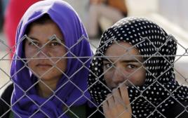 נשים יזידיות שנמלטו מדאעש (צילום: רויטרס)