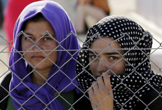 נשים יזידיות שנמלטו מדאעש (צילום:  רויטרס)