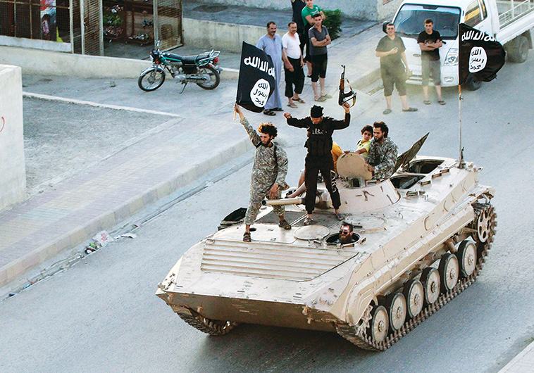 לוחמי ארגון דאעש. צילום: רויטרס