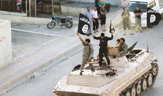 כוחות דאעש בפעולה (צילום: רויטרס)