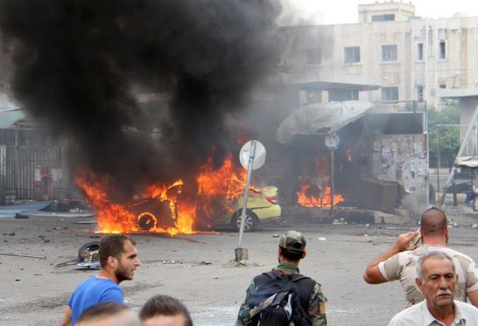 פיגוע בעיר טרטוס בסוריה (צילום:  רויטרס)