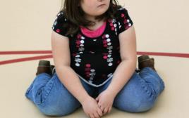 ילדה עם בעיית משקל. צילום אילוסטרציה (צילום: Getty images)