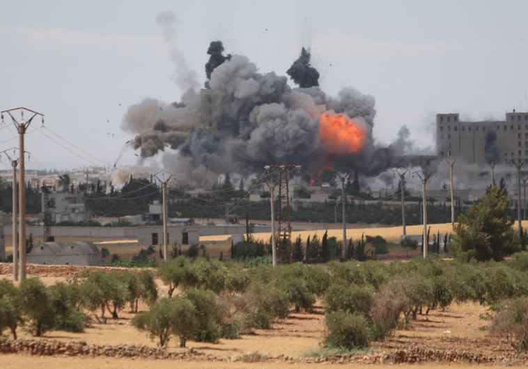 הפצצה אמריקאית על כוחות דאעש בסמוך לגבול הטורקי. צילום: רויטרס