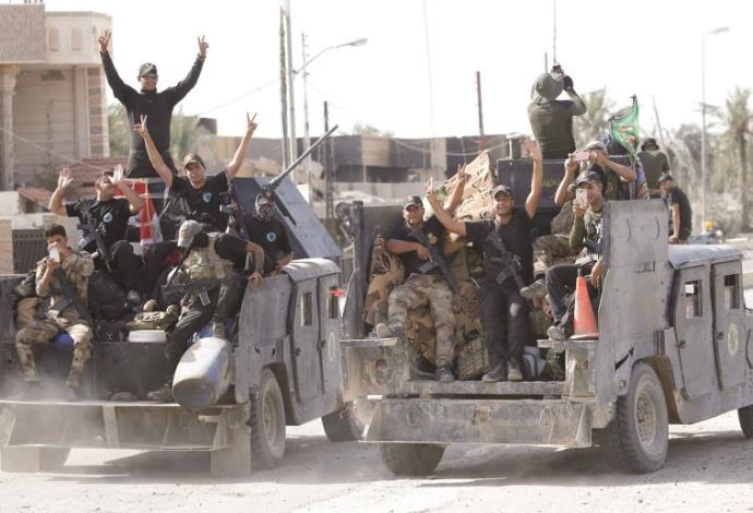 לוחמי מנגנון המאבק בטרור של צבא עיראק (צילום:  רויטרס)