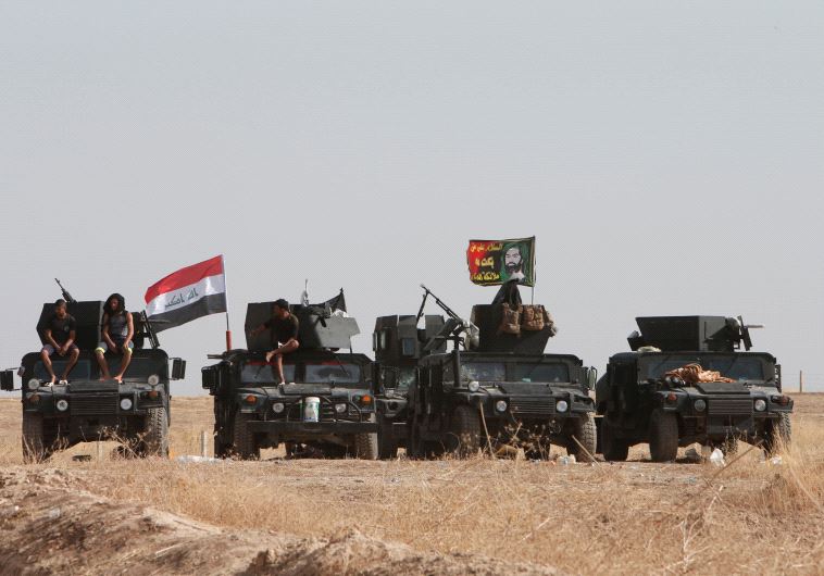כוחות צבא עיראק מתקדמים לעבר מוסול. צילום: רויטרס