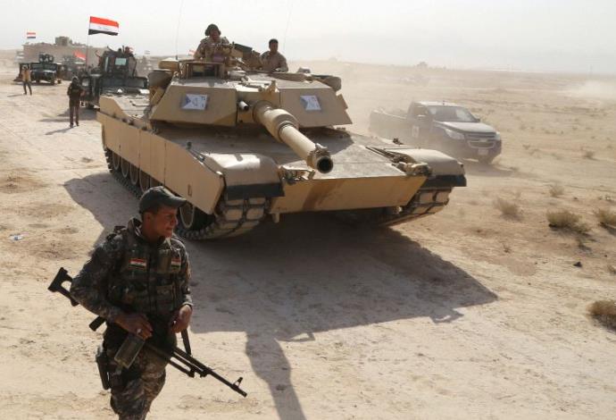 צבא עיראק בדרך למוסול (צילום:  רויטרס)