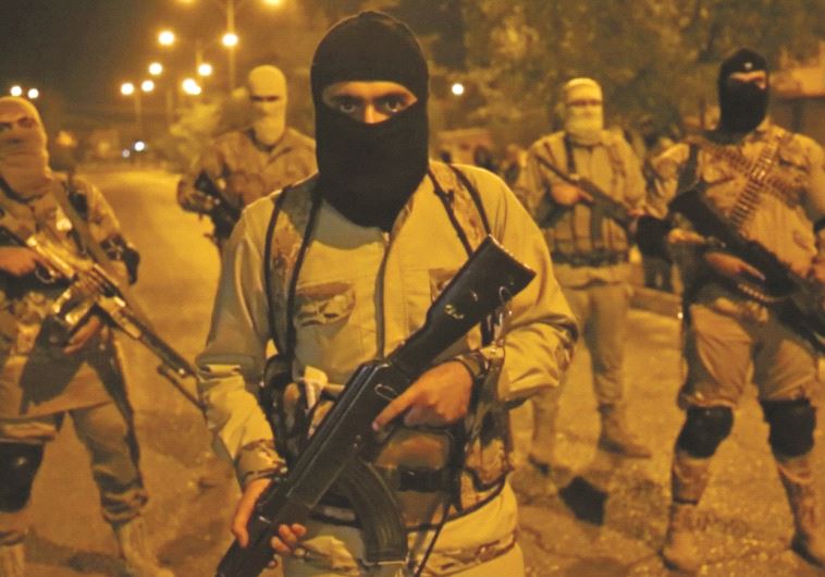 לוחמי דאעש במוסול. צילום: רויטרס