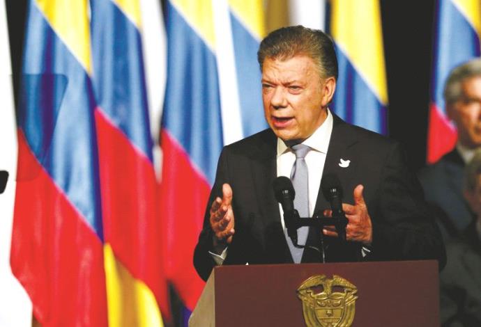נשיא קולומביה חואן מנואל סנטוס  (צילום:  רויטרס, אנדרס מונרוי גומז)