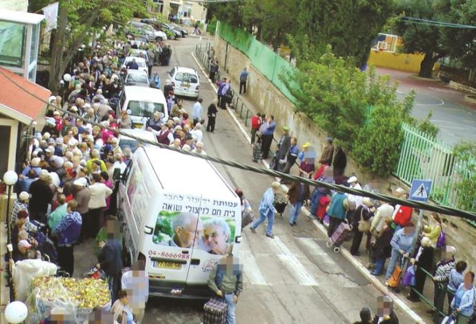חלוקת המזון של עמותת יד עזר לחבר (צילום:  ג'ו לוצ'יאנו)