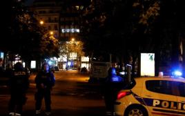 פיגוע בשאנז אליזה בפריז (צילום: AFP)